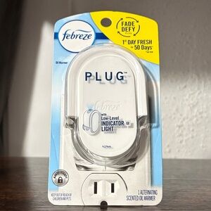 Febreze Plug Oil Warmer with Low-Level Indicator Light